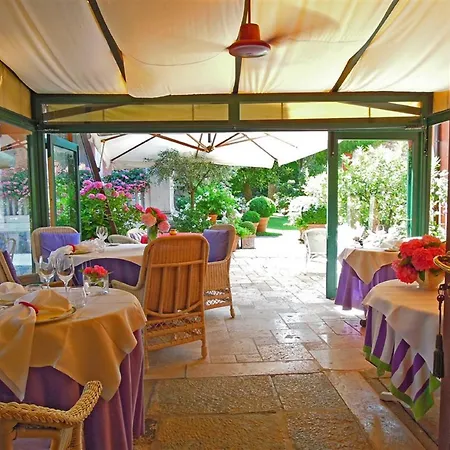 Abbazia Relais & Chateaux Hotell 5*