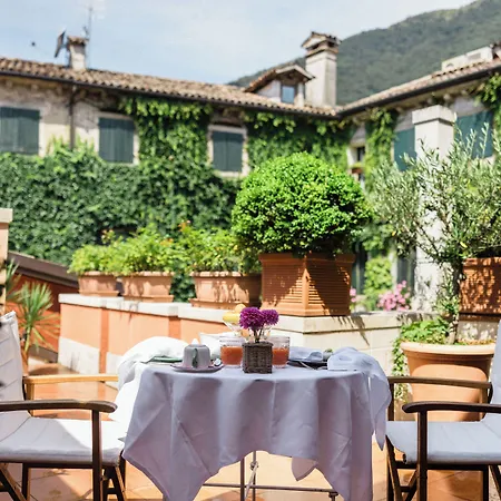 Отель Abbazia Relais & Chateaux 5*