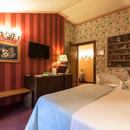 מלון Abbazia Relais & Chateaux 5*