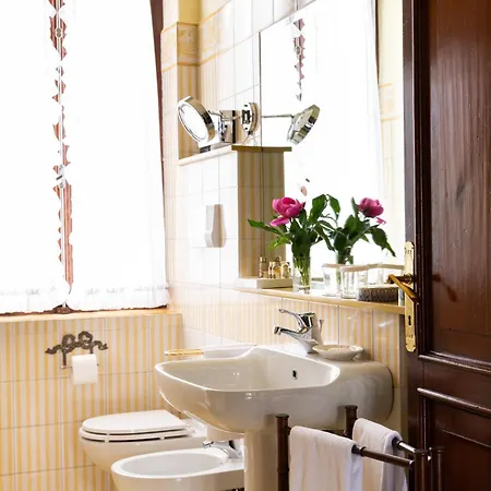 מלון Abbazia Relais & Chateaux 5*