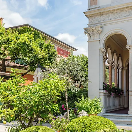 מלון Abbazia Relais & Chateaux 5*